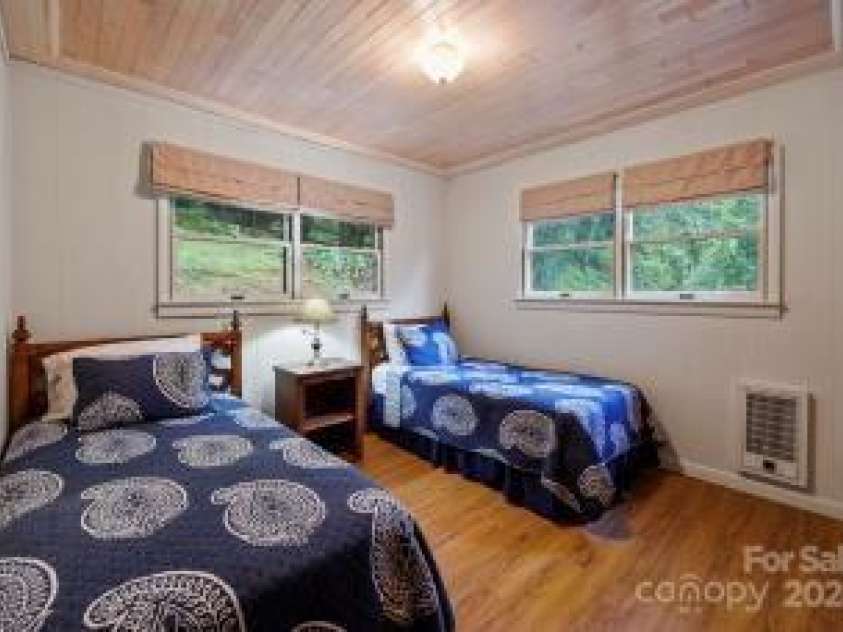 395 Old Fiddle Road, Waynesville, NC 28786.  MLS# CAR4184679, YatesRealty ID 1807. Guest bedroom