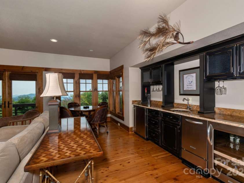 610 Rocky Parkway, Banner Elk, NC 28604.  MLS# CAR4266587, YatesRealty ID 18070. Bar/Entertainment Basement