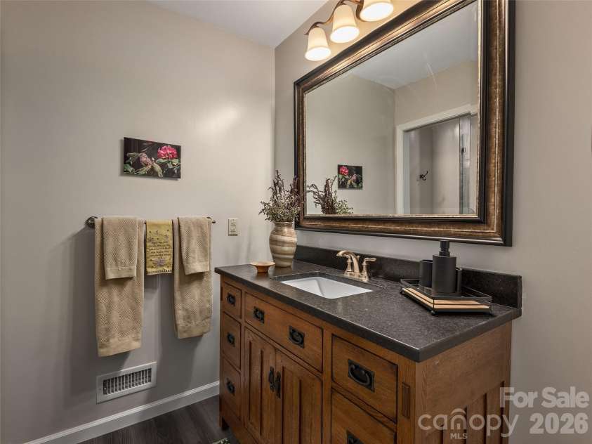 126 Stonebridge Drive, Hendersonville, NC 28739.  MLS# CAR4374699, YatesRealty ID 18072. Downstairs Bathroom