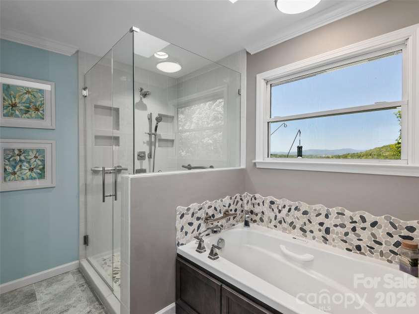 126 Stonebridge Drive, Hendersonville, NC 28739.  MLS# CAR4374699, YatesRealty ID 18072. Primary Bathroom with a Mountain View