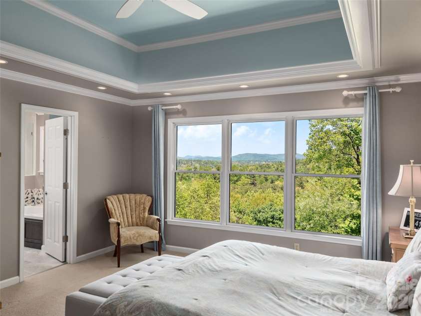 126 Stonebridge Drive, Hendersonville, NC 28739.  MLS# CAR4374699, YatesRealty ID 18072. Primary Bedroom with a Mountain View