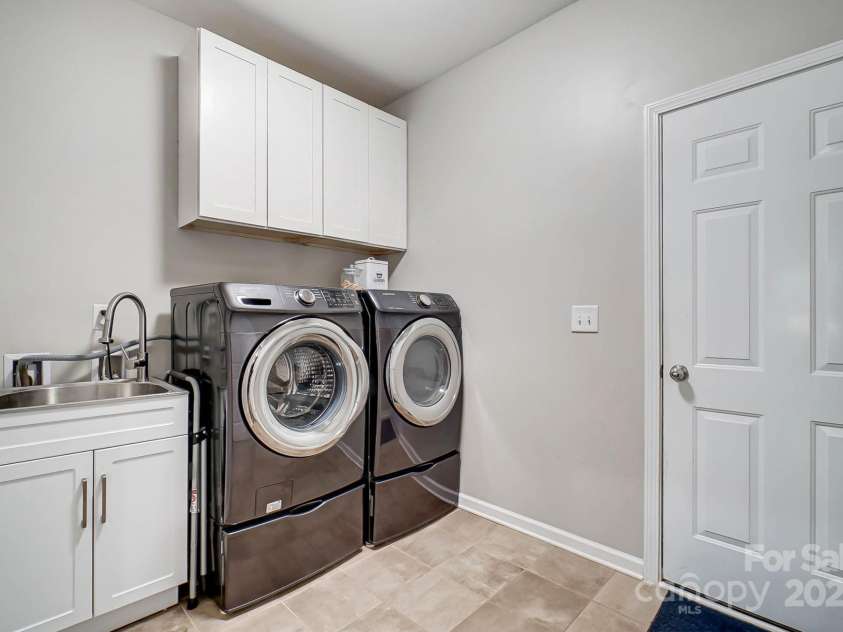 7348 Adirondack Drive, Denver, NC 28037.  MLS# CAR4232291, YatesRealty ID 18073. Laundry room off of the garage