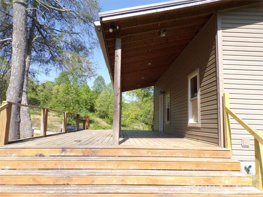202 Honor Lane, Hendersonville, NC 28792.  MLS# CAR4345433, YatesRealty ID 18074. Front deck