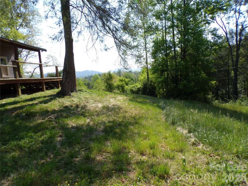 202 Honor Lane, Hendersonville, NC 28792.  MLS# CAR4345433, YatesRealty ID 18074. Front yard