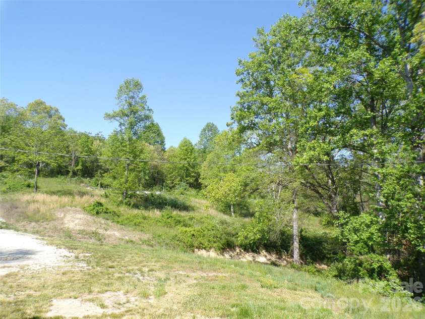 202 Honor Lane, Hendersonville, NC 28792.  MLS# CAR4345433, YatesRealty ID 18074. Land view