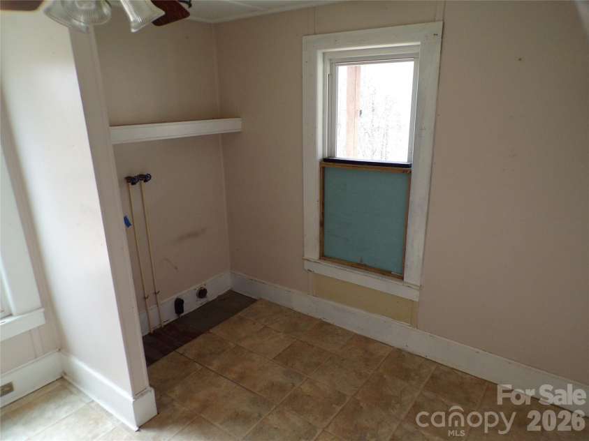 202 Honor Lane, Hendersonville, NC 28792.  MLS# CAR4345433, YatesRealty ID 18074. Laundry area
