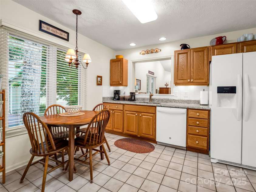 11 Wedge Court, Hendersonville, NC 28739.  MLS# CAR4260142, YatesRealty ID 18075. Breakfast area in Kitchen