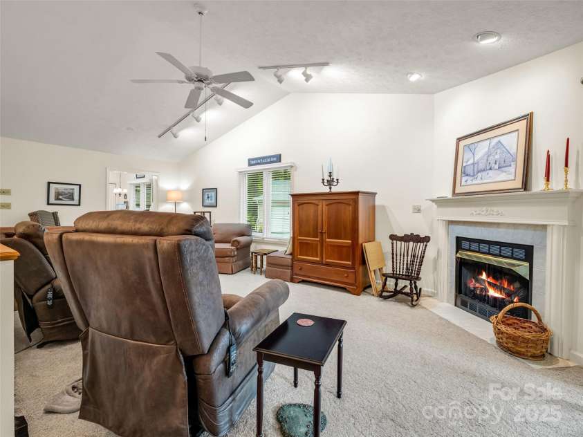 11 Wedge Court, Hendersonville, NC 28739.  MLS# CAR4260142, YatesRealty ID 18075. Cozy Fireplace