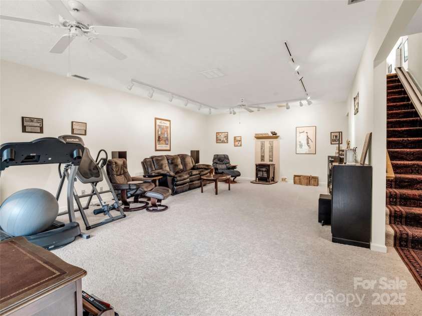 11 Wedge Court, Hendersonville, NC 28739.  MLS# CAR4260142, YatesRealty ID 18075. Lower Level family room