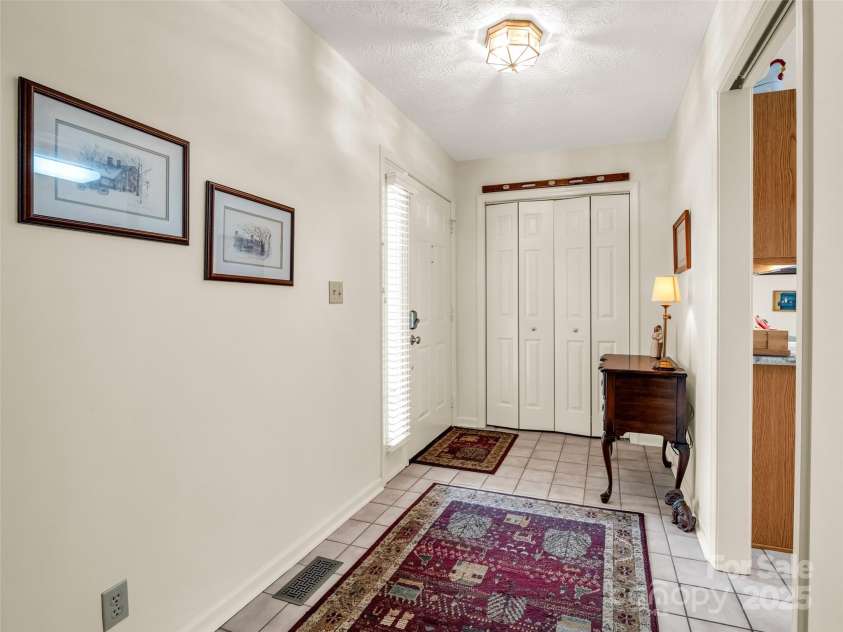 11 Wedge Court, Hendersonville, NC 28739.  MLS# CAR4260142, YatesRealty ID 18075. Welcoming Foyer