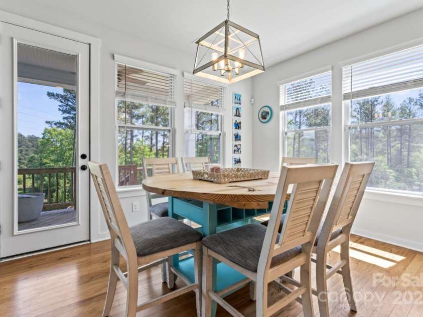 1274 Fishing Creek Road, Clover, SC 29710.  MLS# CAR4240716, YatesRealty ID 18076. Breakfast nook w/ custom light fixture & tons of natural light
