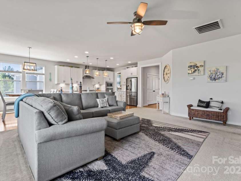 1274 Fishing Creek Road, Clover, SC 29710.  MLS# CAR4240716, YatesRealty ID 18076. Ceiling fan in open family room