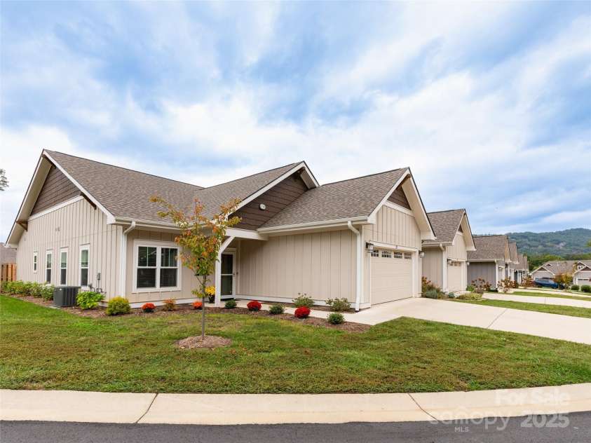 32 Cozy Cottage Way, Arden, NC 28704.  MLS# CAR4308259, YatesRealty ID 18080. A beautiful townhome with no immediate neighbor to the left.