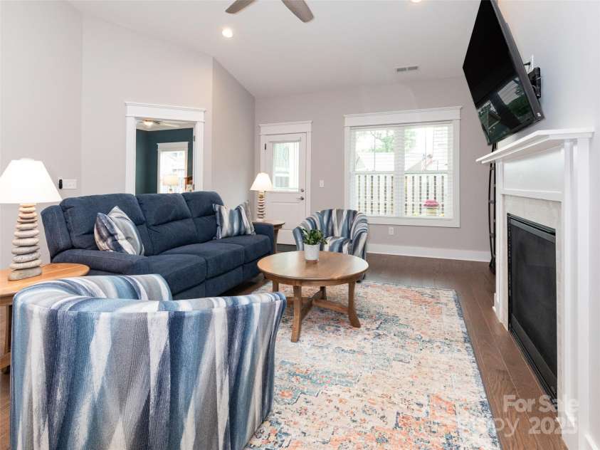 32 Cozy Cottage Way, Arden, NC 28704.  MLS# CAR4308259, YatesRealty ID 18080. Enjoy a quiet night with a book, some TV, or just gazing at the fireplace.