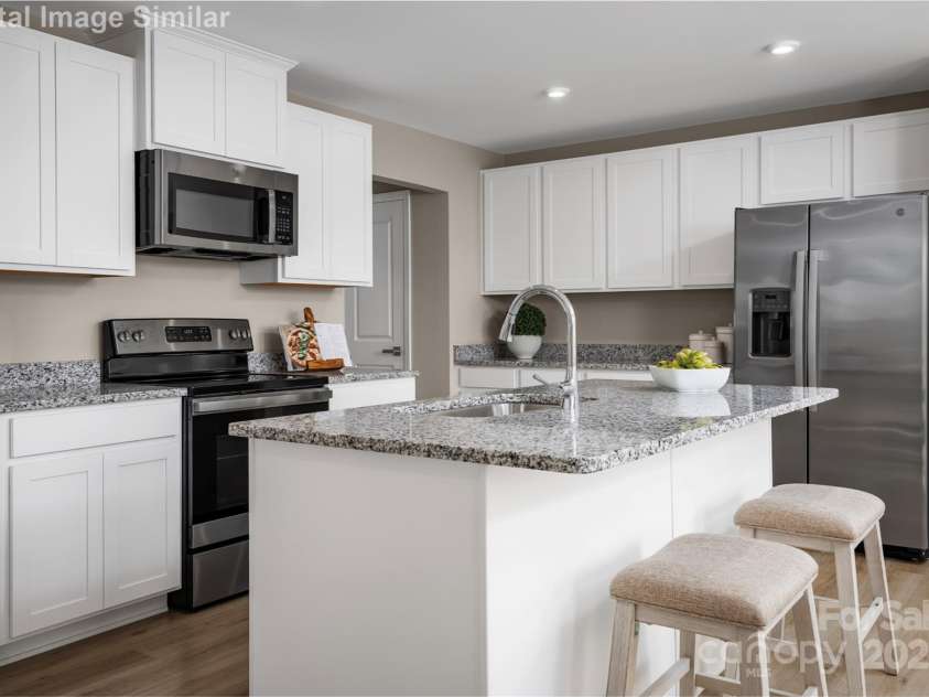 5220 McCallum Meadows Drive, Charlotte, NC 28216.  MLS# CAR4252096, YatesRealty ID 18081. 