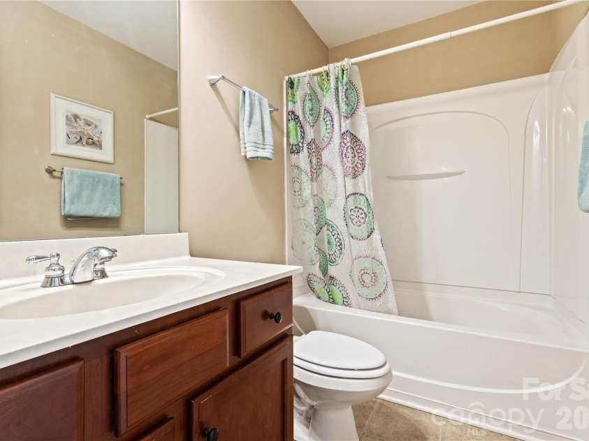 8458 Mossy Cup Trail, Harrisburg, NC 28075.  MLS# CAR4372770, YatesRealty ID 18086. Second story Hall Full Bath