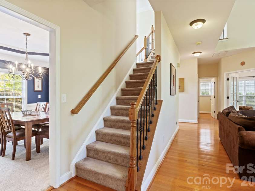 8458 Mossy Cup Trail, Harrisburg, NC 28075.  MLS# CAR4372770, YatesRealty ID 18086. Stairs leading to second floor