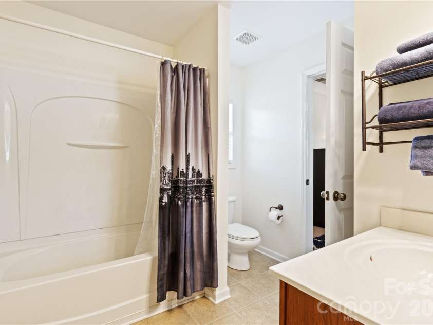 8458 Mossy Cup Trail, Harrisburg, NC 28075.  MLS# CAR4372770, YatesRealty ID 18086. Third Floor Full bathroom