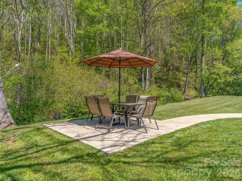 5881 US 23 Highway, Mars Hill, NC 28754.  MLS# CAR4374196, YatesRealty ID 18088. Creekside patio