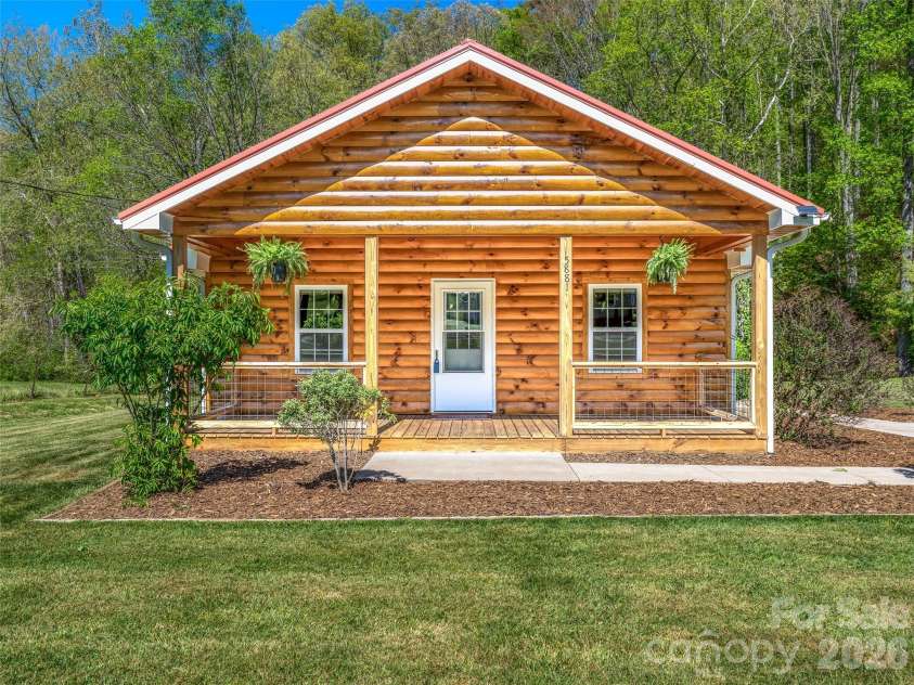 5881 US 23 Highway, Mars Hill, NC 28754.  MLS# CAR4374196, YatesRealty ID 18088. Rocking chair front proch