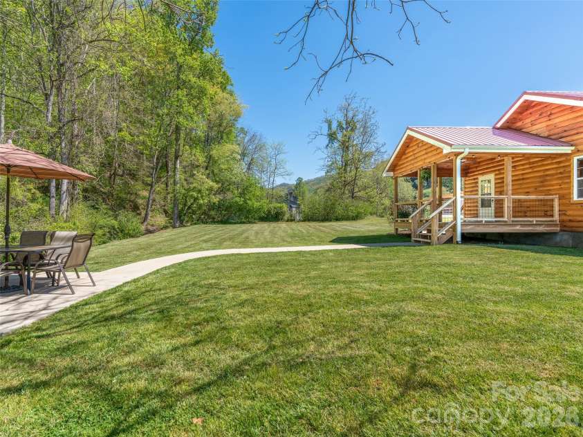 5881 US 23 Highway, Mars Hill, NC 28754.  MLS# CAR4374196, YatesRealty ID 18088. Spacious back yard