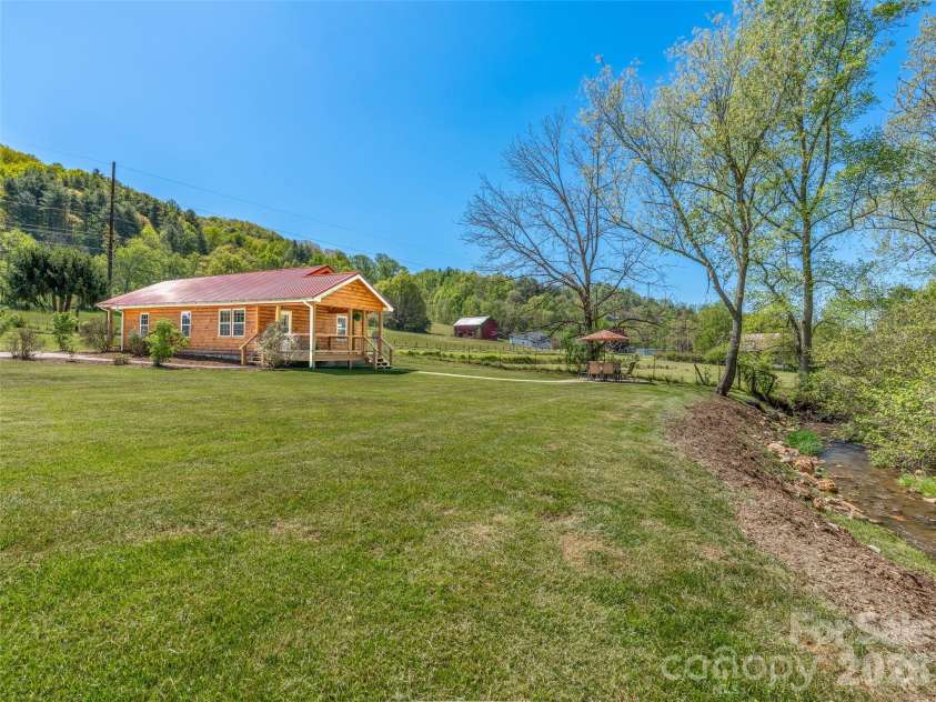 5881 US 23 Highway, Mars Hill, NC 28754.  MLS# CAR4374196, YatesRealty ID 18088. Spacious yard