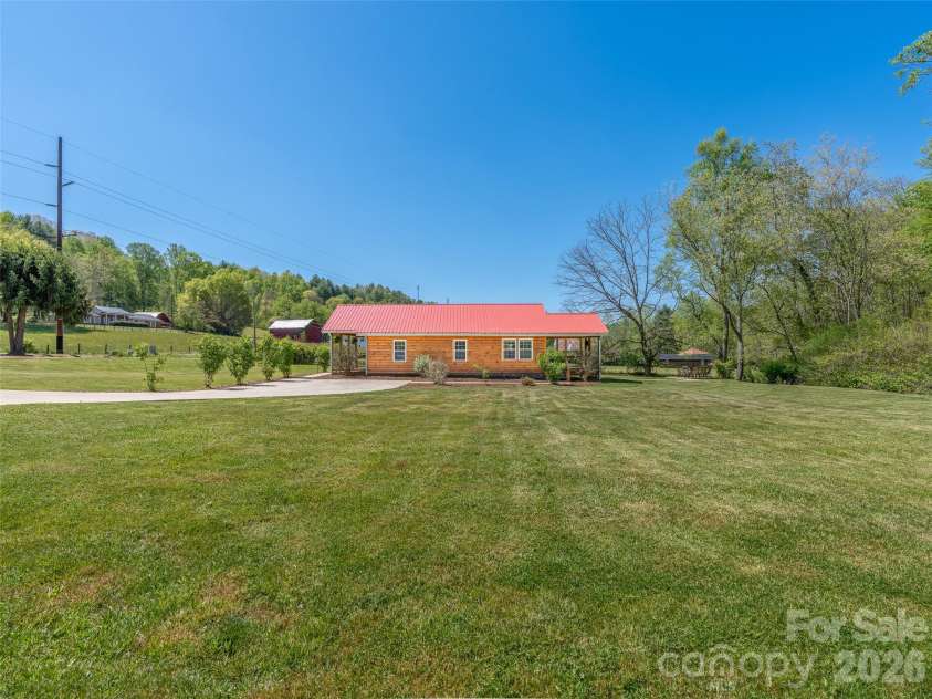5881 US 23 Highway, Mars Hill, NC 28754.  MLS# CAR4374196, YatesRealty ID 18088. Spacious yard