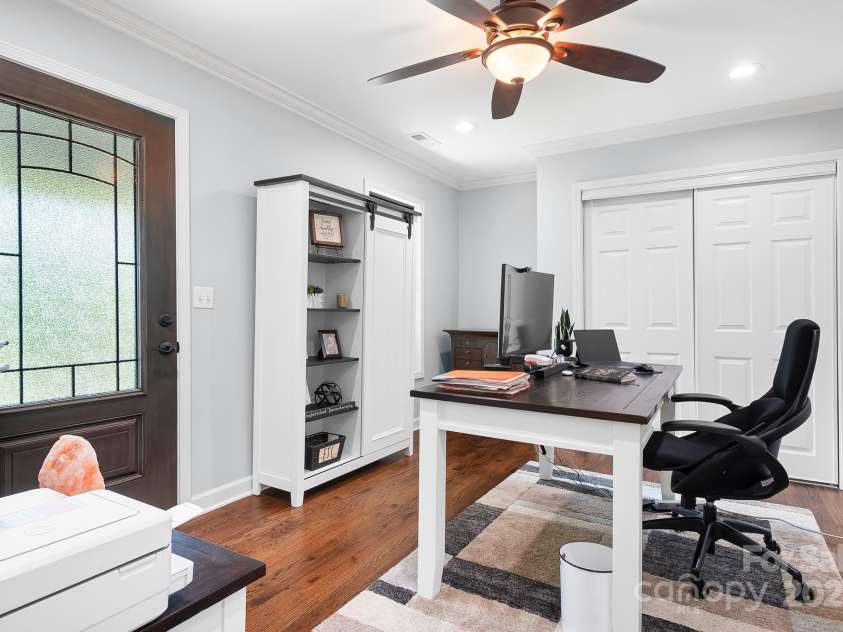 317 Marietta Road, Mooresville, NC 28117.  MLS# CAR4253368, YatesRealty ID 18093. Another secondary bedroom being used as an office.  Walks out to Juliet Balcony with wonderful lake views.