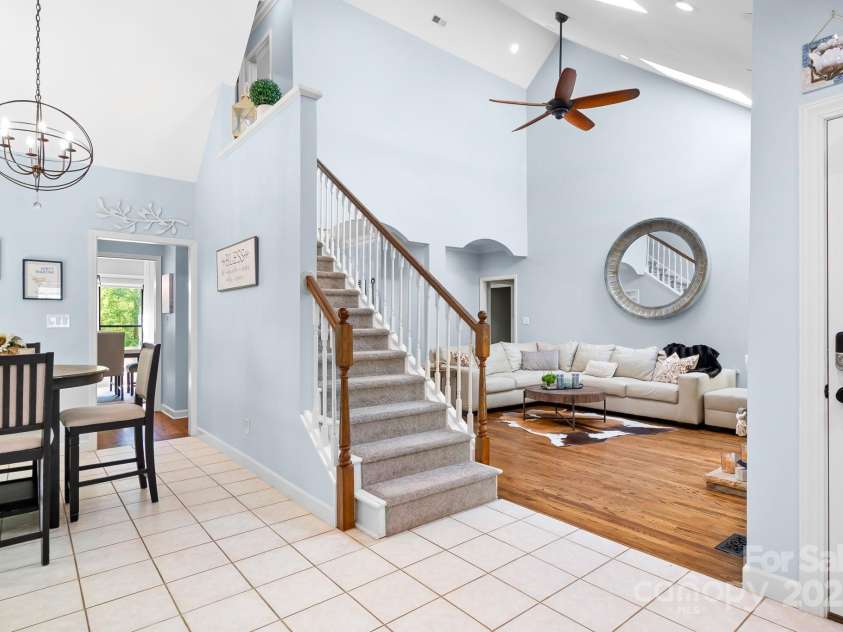 317 Marietta Road, Mooresville, NC 28117.  MLS# CAR4253368, YatesRealty ID 18093. Breakfast area which looks out to the beautiful, thick woods where many deer gather daily.
