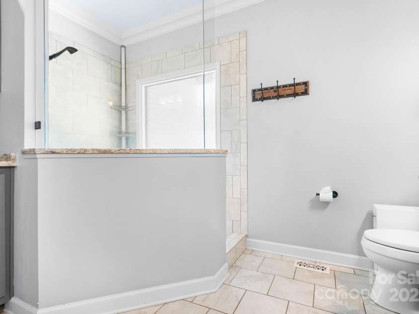 317 Marietta Road, Mooresville, NC 28117.  MLS# CAR4253368, YatesRealty ID 18093. Large bright walk in shower