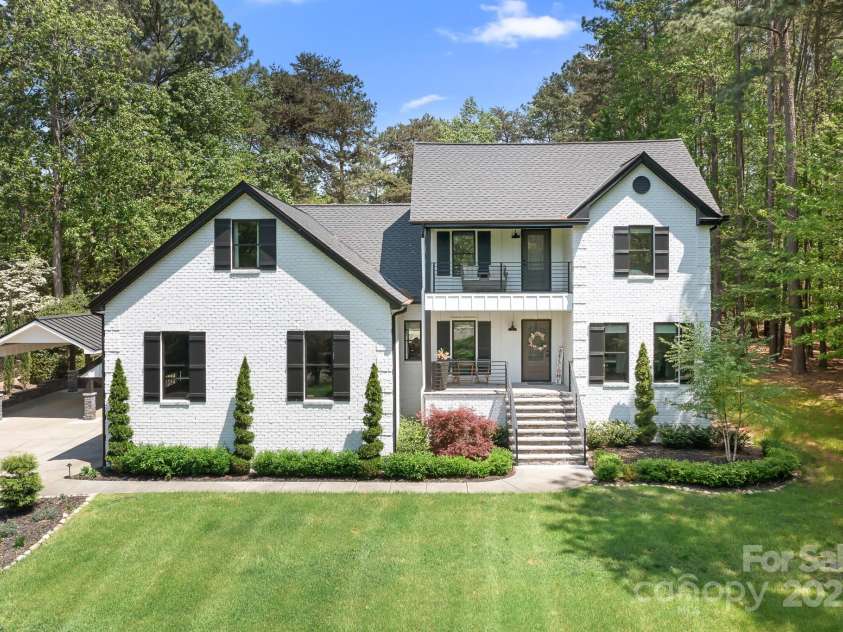 317 Marietta Road, Mooresville, NC 28117.  MLS# CAR4253368, YatesRealty ID 18093. Lovely updated home with amazing curb appeal. Fresh paint inside and out and Architectural Car Port just 2 of the many upgrades and updates.