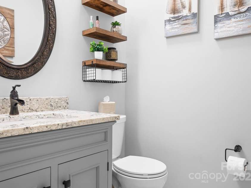 317 Marietta Road, Mooresville, NC 28117.  MLS# CAR4253368, YatesRealty ID 18093. Main level powder room
