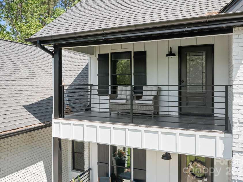 317 Marietta Road, Mooresville, NC 28117.  MLS# CAR4253368, YatesRealty ID 18093. New tile, new railing and lake views meeting the beautiful long wooded lot.  Heaven!