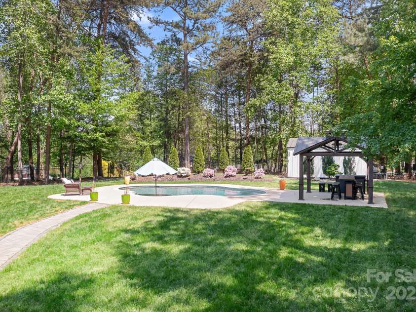 317 Marietta Road, Mooresville, NC 28117.  MLS# CAR4253368, YatesRealty ID 18093. Saltwater Pool, Gazebo and Shed