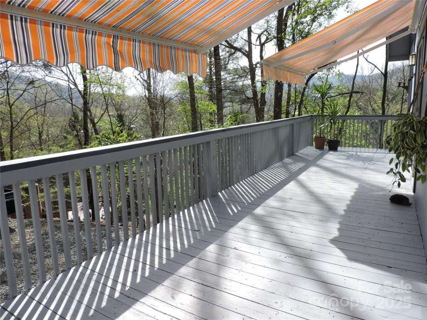 380 River Ridge Drive, Burnsville, NC 28714.  MLS# CAR4248801, YatesRealty ID 18096. Front Deck with Awnings out
