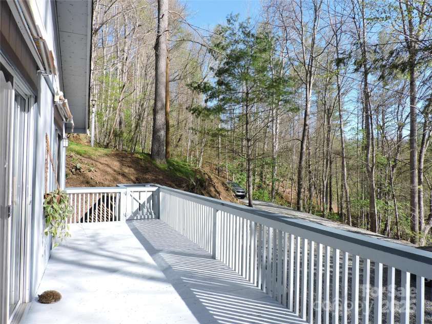 380 River Ridge Drive, Burnsville, NC 28714.  MLS# CAR4248801, YatesRealty ID 18096. Front Deck With gate