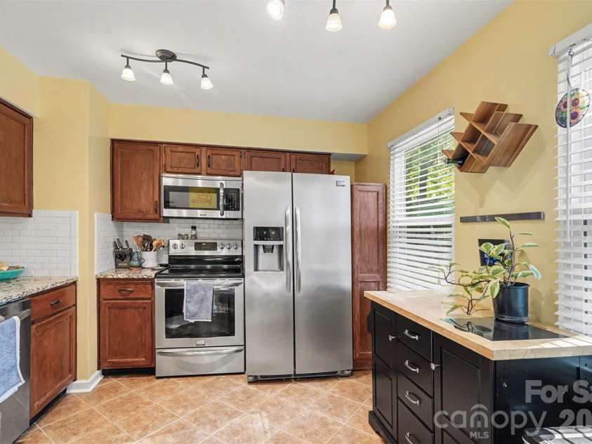 12213 Woodside Falls Road, Pineville, NC 28134.  MLS# CAR4372444, YatesRealty ID 18099. 