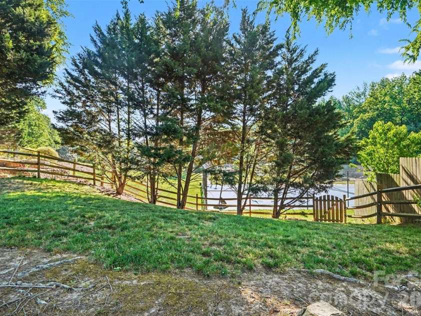 12213 Woodside Falls Road, Pineville, NC 28134.  MLS# CAR4372444, YatesRealty ID 18099. 