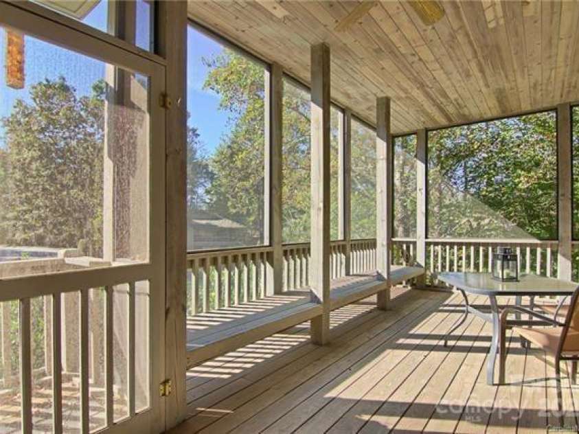3503 Mountain Top Way, Hendersonville, NC 28739.  MLS# CAR4232663, YatesRealty ID 18102. Wrap around screened Mtn view porch