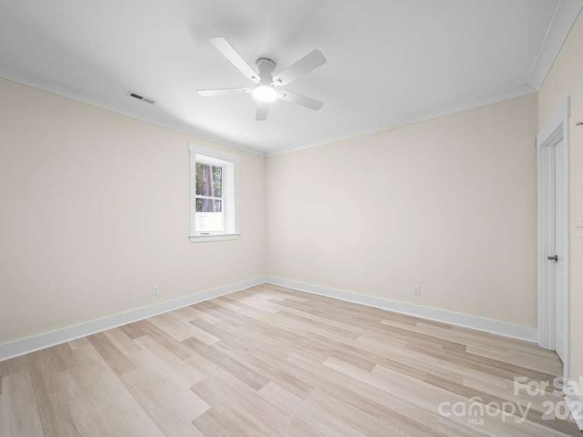 4460 R L Lane, Midland, NC 28107.  MLS# CAR4302078, YatesRealty ID 18103. Downstairs Bedroom