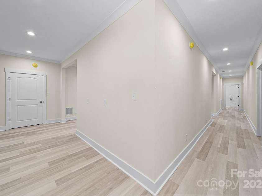 4460 R L Lane, Midland, NC 28107.  MLS# CAR4302078, YatesRealty ID 18103. Downstairs Hallway