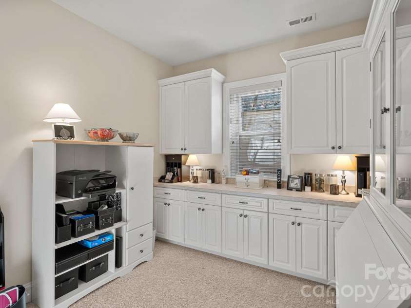 8056 Windsong Road, Denver, NC 28037.  MLS# CAR4338540, YatesRealty ID 18104. Craft room / flex space with built-ins for your extras.