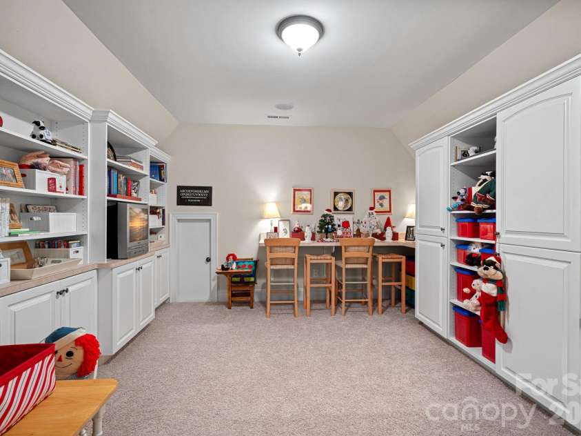 8056 Windsong Road, Denver, NC 28037.  MLS# CAR4338540, YatesRealty ID 18104. Play room /additional bonus room with attic storage.