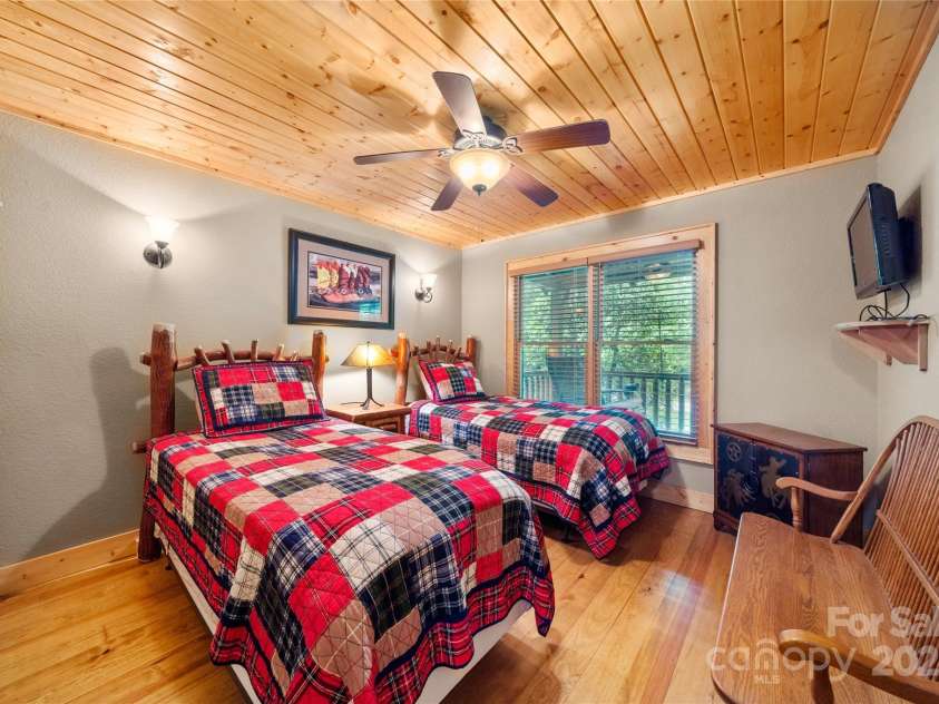 86 Sweet Birch Drive, Maggie Valley, NC 28751.  MLS# CAR4261566, YatesRealty ID 18106. 2nd bedroom on the main level