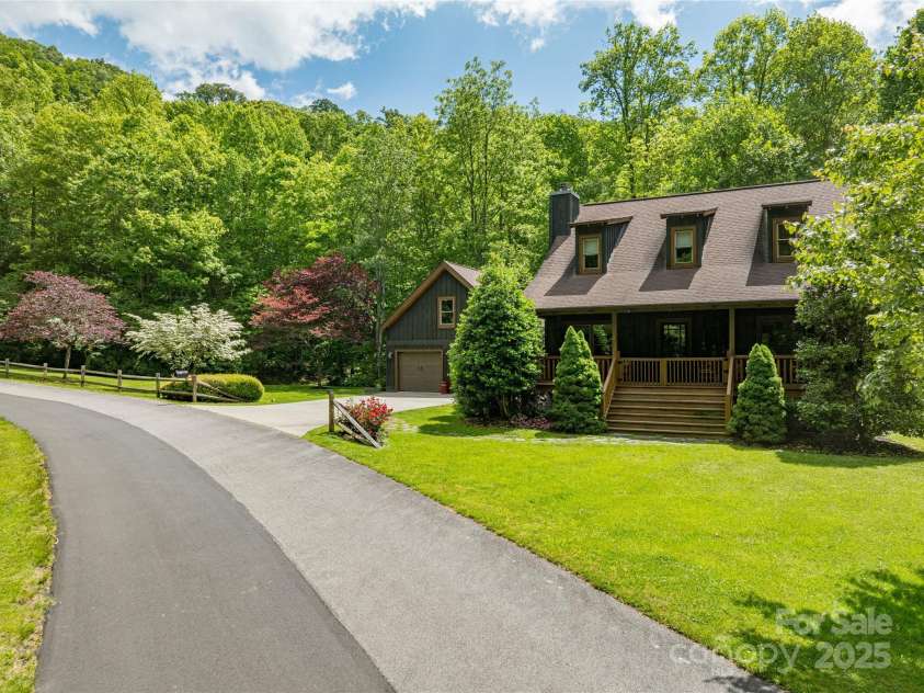 86 Sweet Birch Drive, Maggie Valley, NC 28751.  MLS# CAR4261566, YatesRealty ID 18106. Quiet neighborhood road - approach to the house