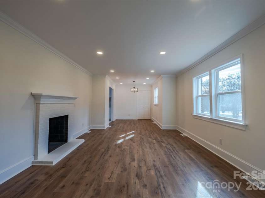 6305 Dale Avenue, Charlotte, NC 28212.  MLS# CAR4216186, YatesRealty ID 18107. Living Room with Fireplace