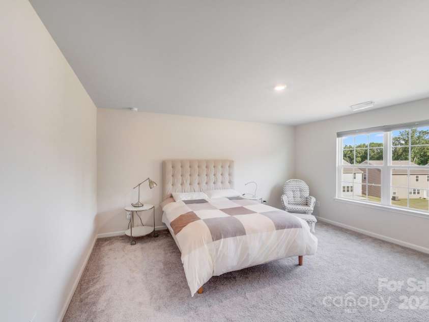 356 Runner Stone Lane, Fort Mill, SC 29715.  MLS# CAR4253320, YatesRealty ID 18108. Expansive Primary Bedroom upstairs