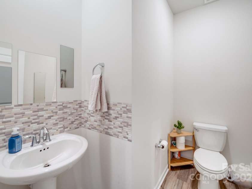 356 Runner Stone Lane, Fort Mill, SC 29715.  MLS# CAR4253320, YatesRealty ID 18108. Large powder room on main level