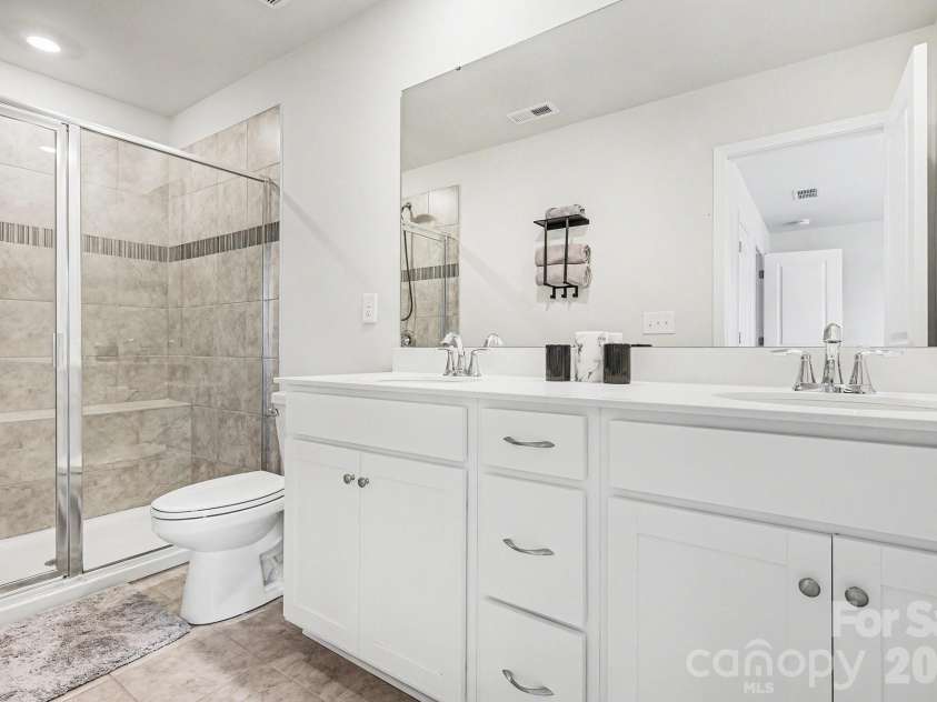 117 Morning Gap Parkway, Fort Mill, SC 29715.  MLS# CAR4333429, YatesRealty ID 1812. Full bathroom for additional bedroom on third floor. 