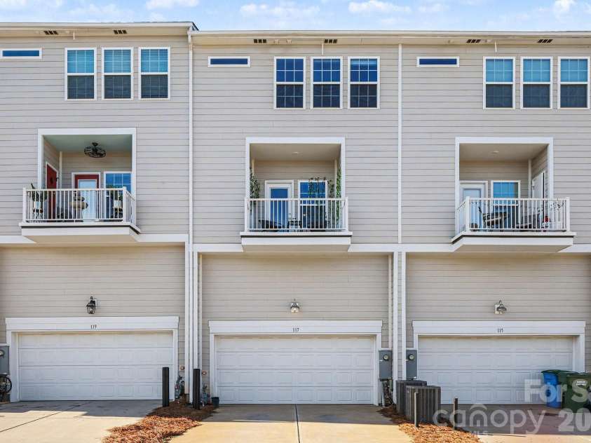 117 Morning Gap Parkway, Fort Mill, SC 29715.  MLS# CAR4333429, YatesRealty ID 1812. Garage is rear facing and under balcony. 